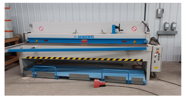 Roll-forming machine for metal panels